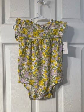 Floral romper with ruffle sleeves